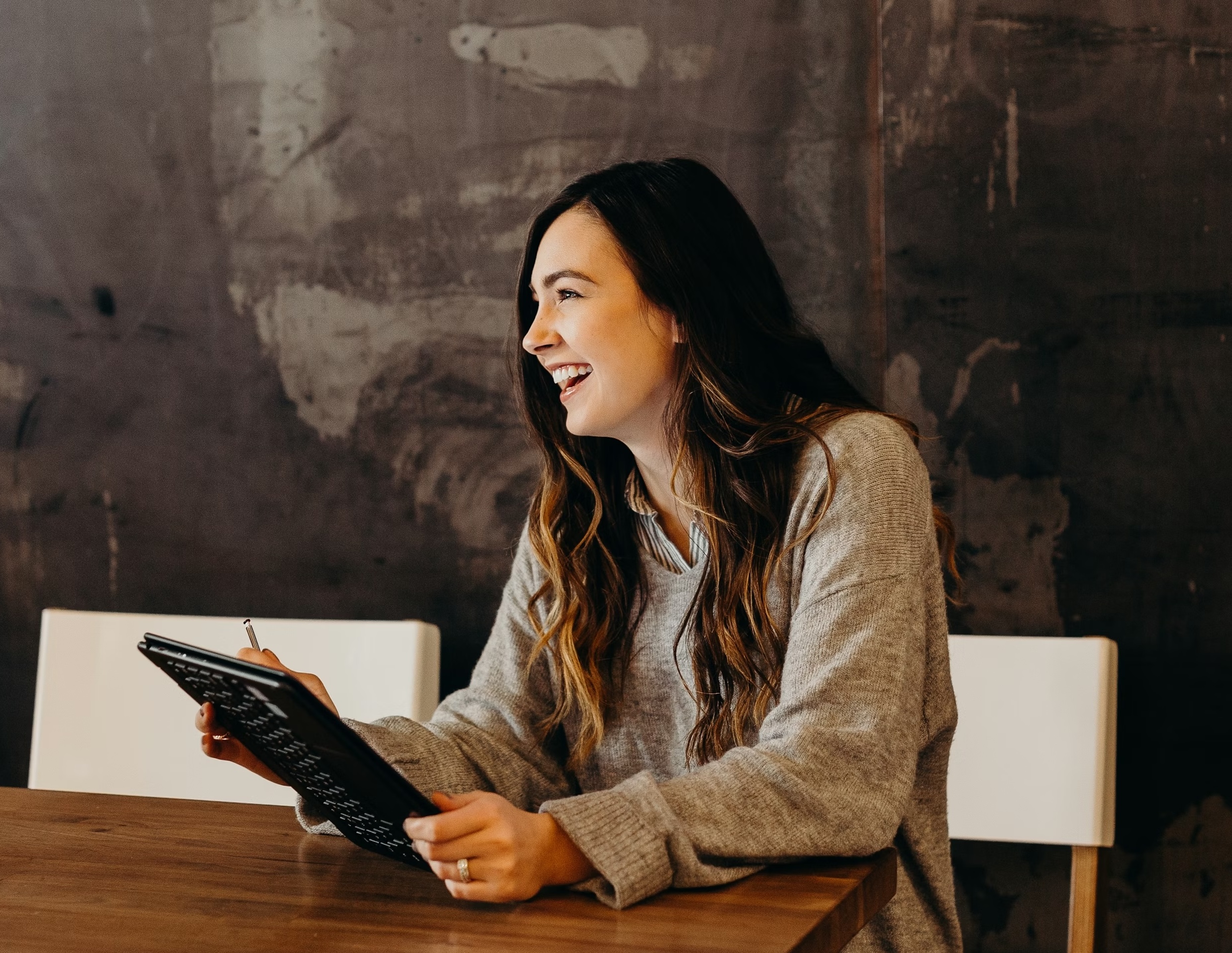 Small business owner working with AI tools